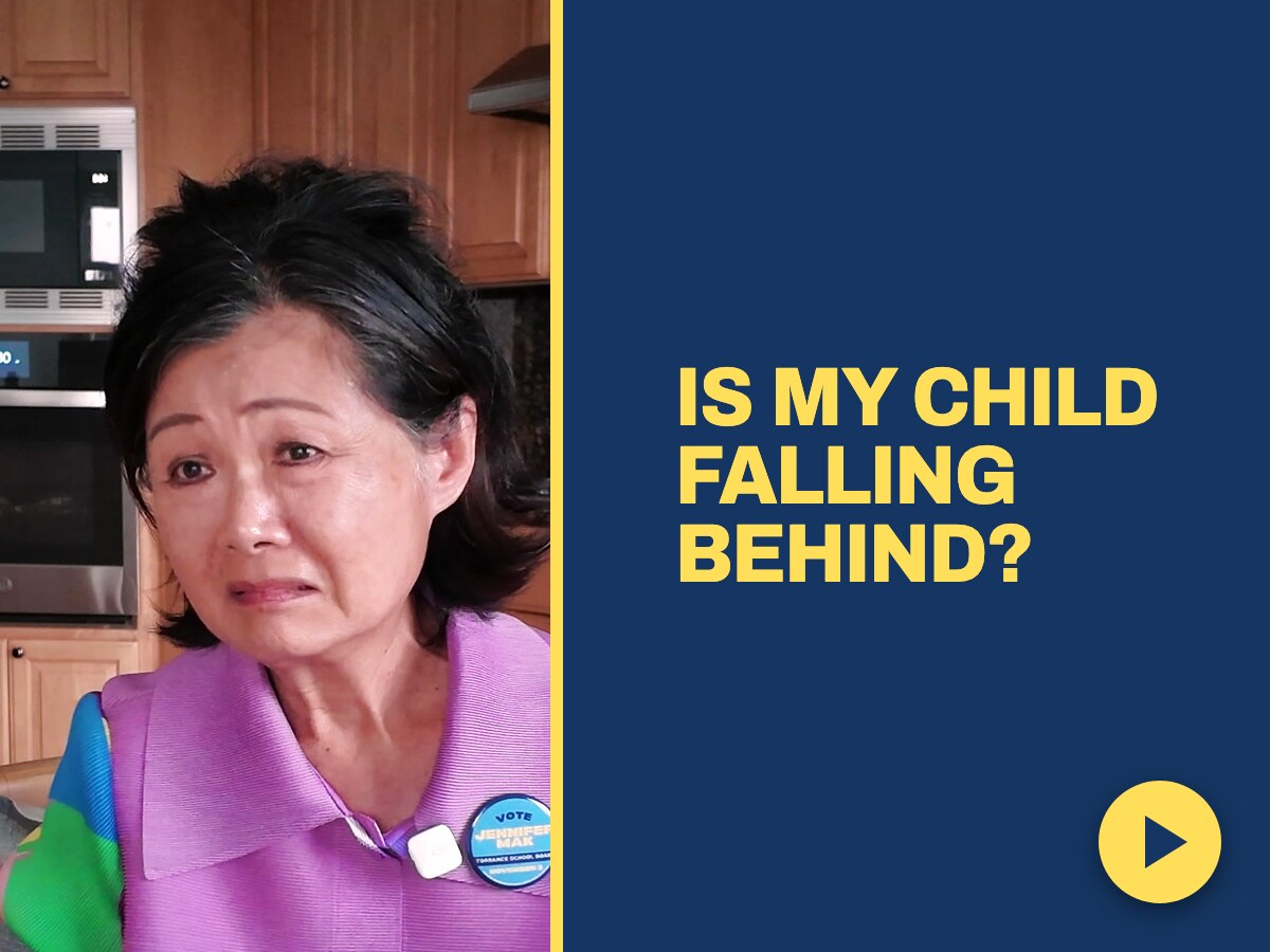 Jennifer Mak at her kitchen table answering a parent worried their child is falling behind