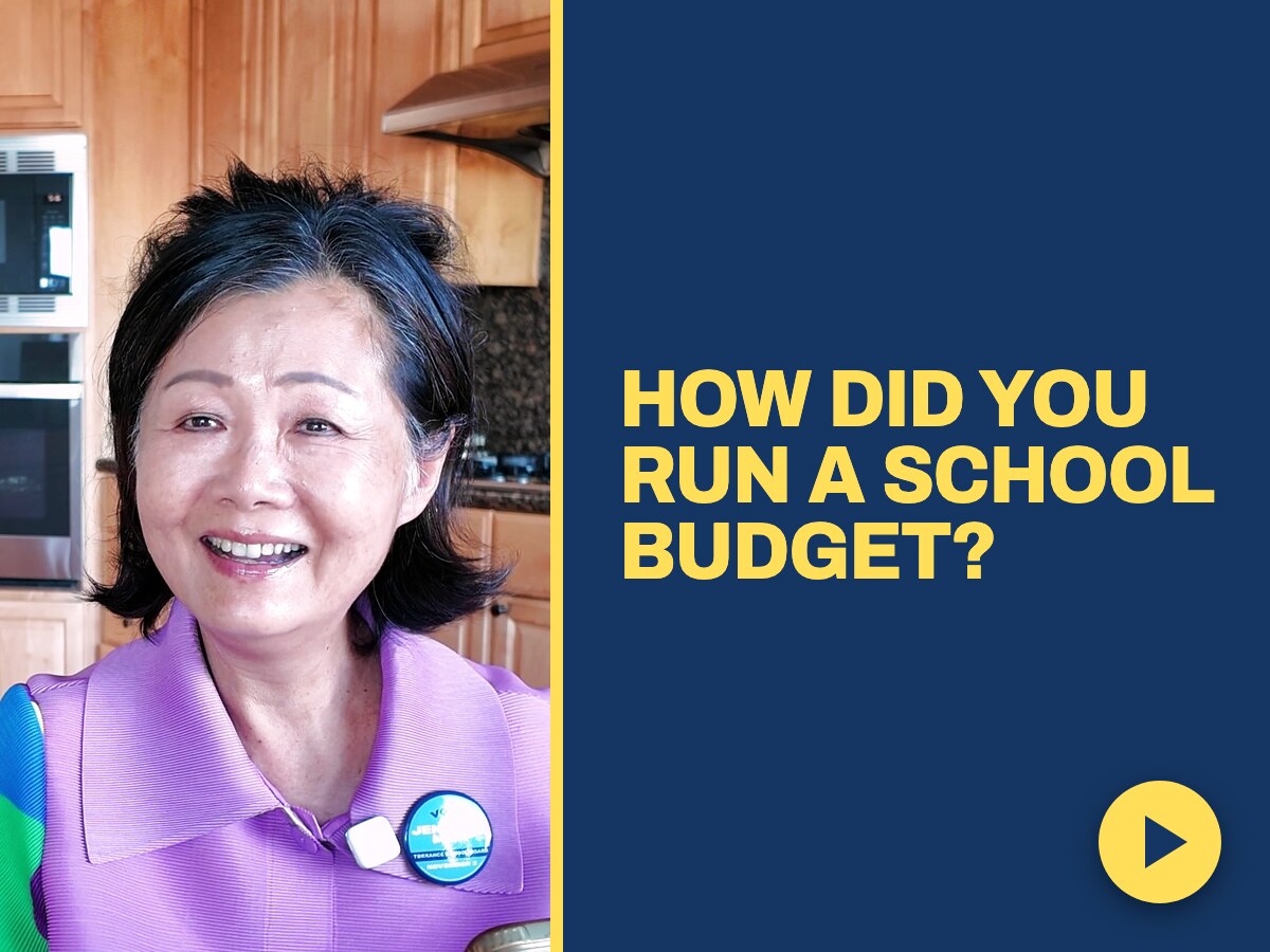 Jennifer Mak at her kitchen table explaining how she ran a school budget
