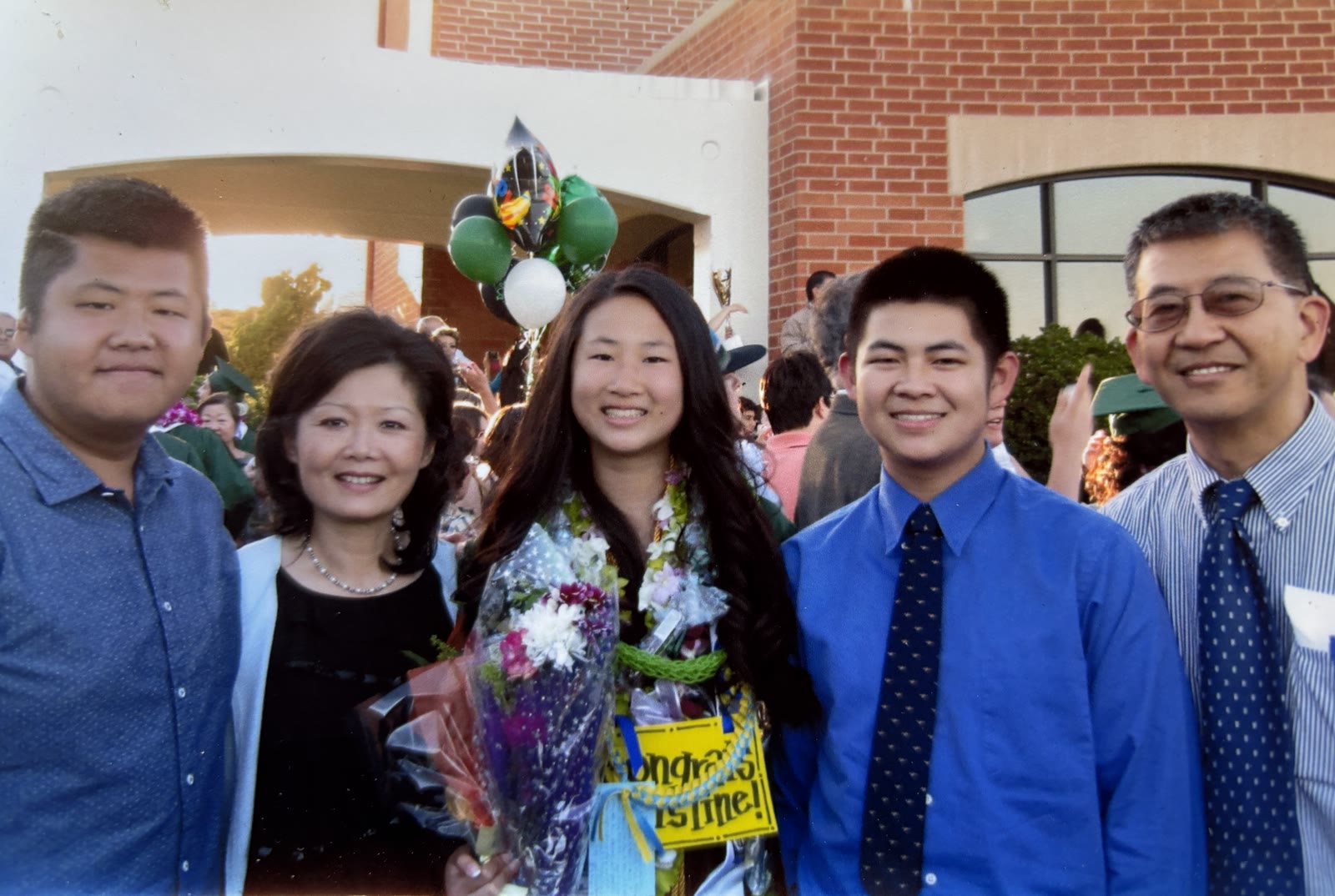 Jennifer Mak with her husband and their three children at a South High School graduation in Torrance