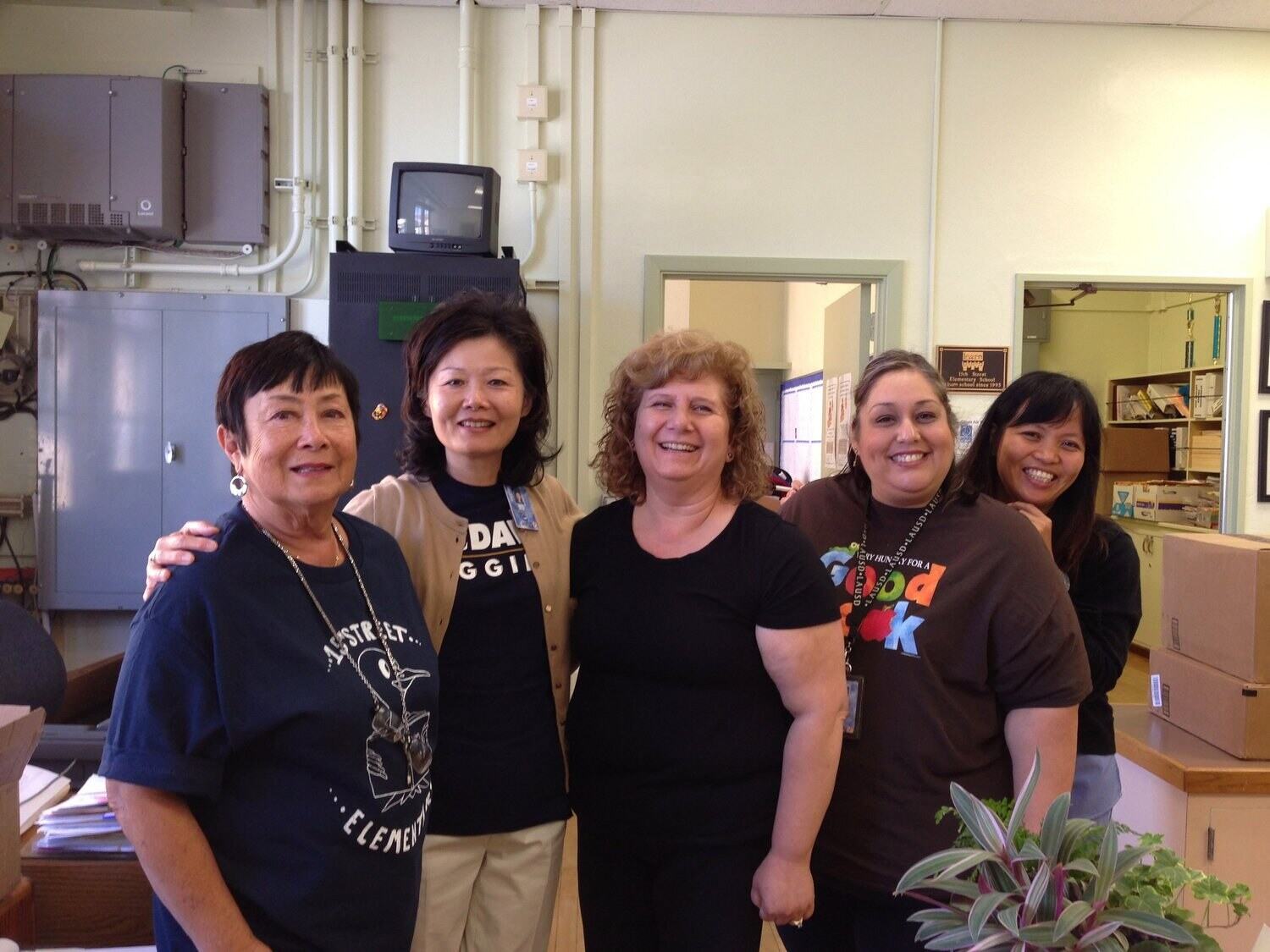 Jennifer with her office team at 15th Street School