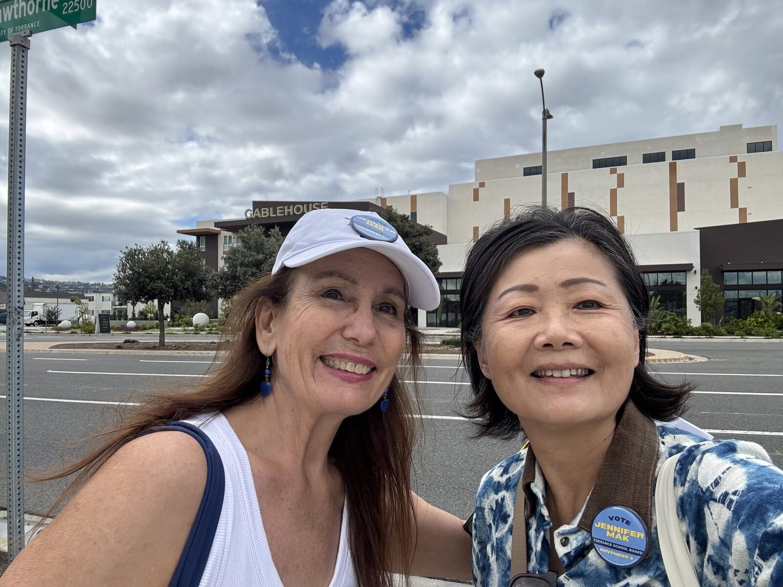 Jennifer Mak with a supporter while canvassing