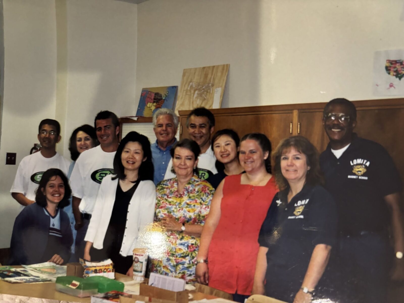 Jennifer Mak (center, in white) with Lomita colleagues