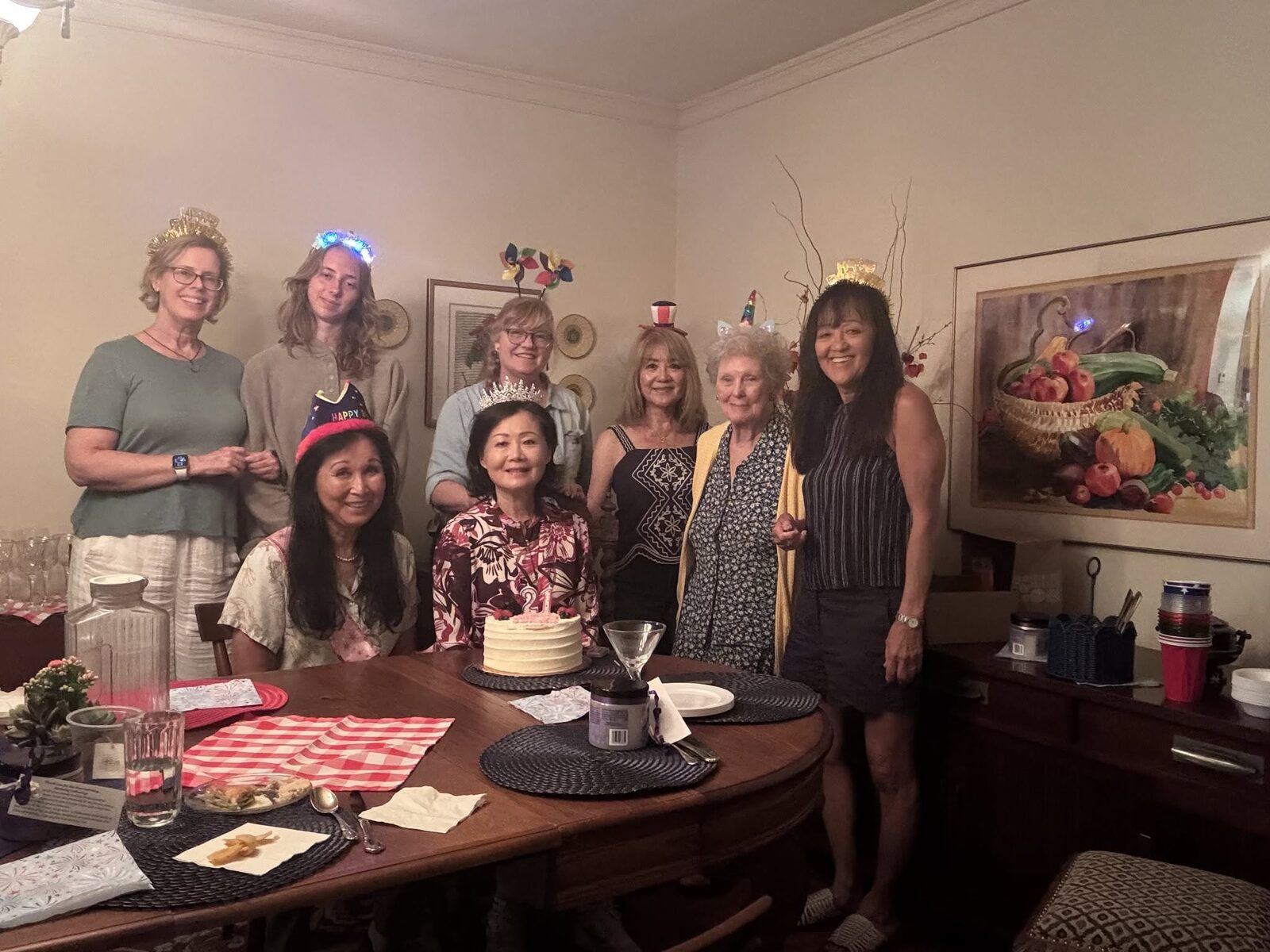 Jennifer Mak (right) with friends around a dinner table