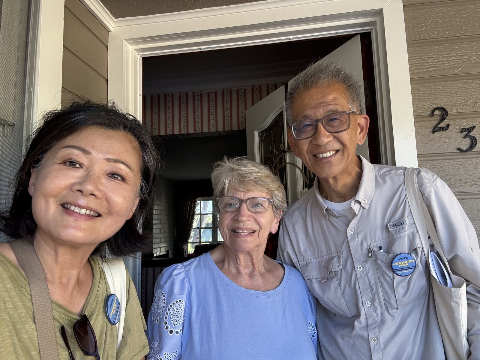 Jennifer Mak with Donna Bobb at her door while canvassing