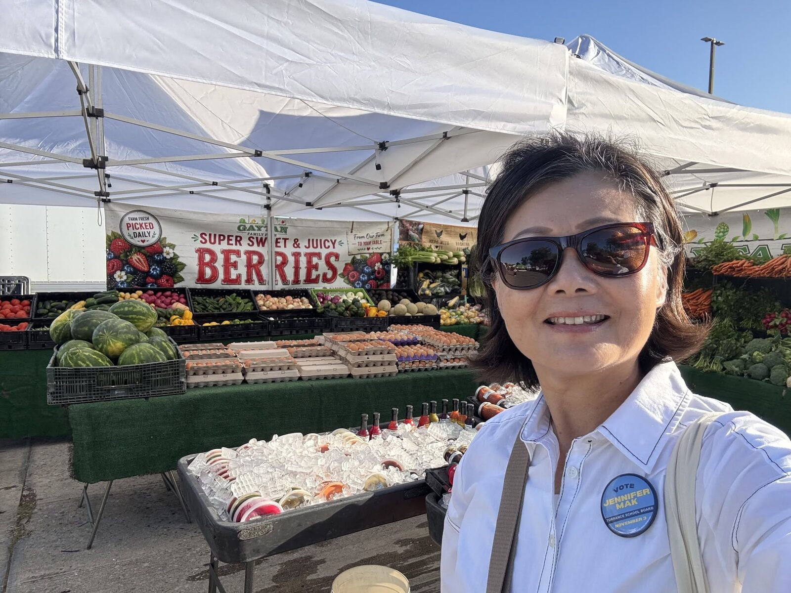 Jennifer Mak at a produce stand while canvassing