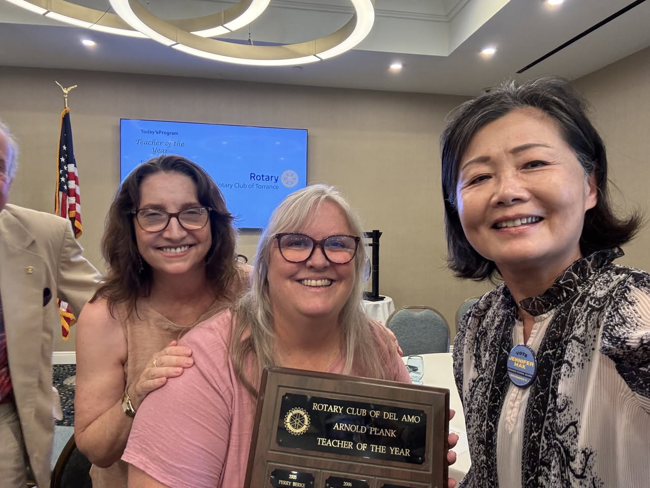 Jennifer Mak with Susan Eriksen holding the Arnold Plank Teacher of the Year plaque