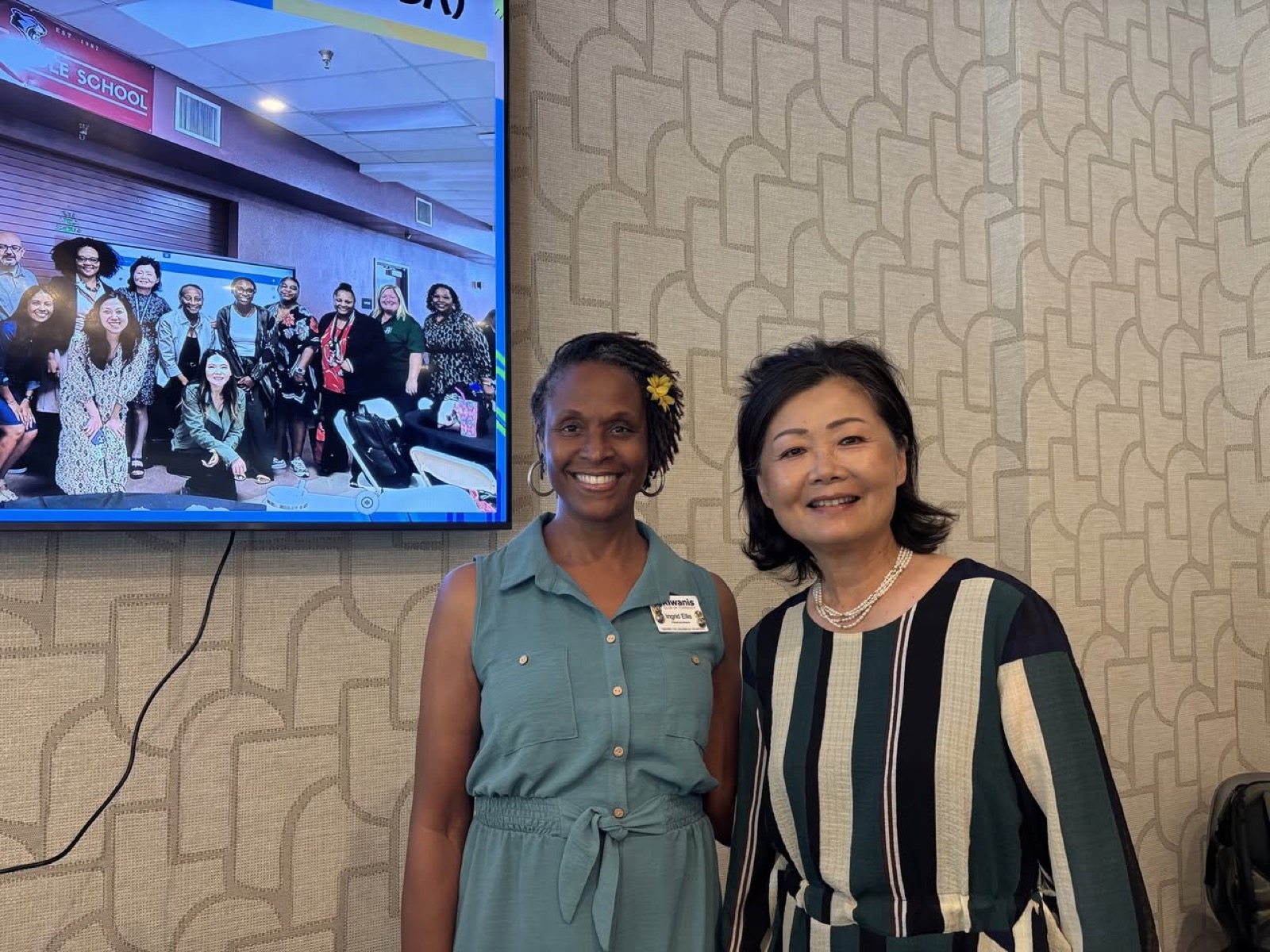 Jennifer Mak with a Kiwanis Club of Torrance member after the talk