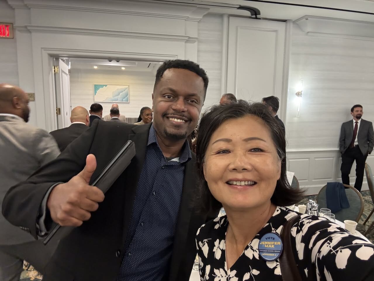 Jennifer Mak with a guest at the State of the City Address