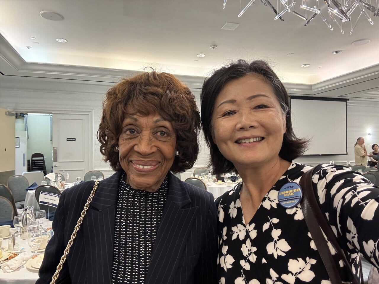 Jennifer Mak with a guest at the State of the City Address