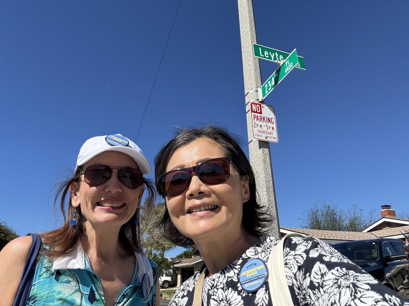 Jennifer Mak canvassing with a supporter at Leyte and 234th Place