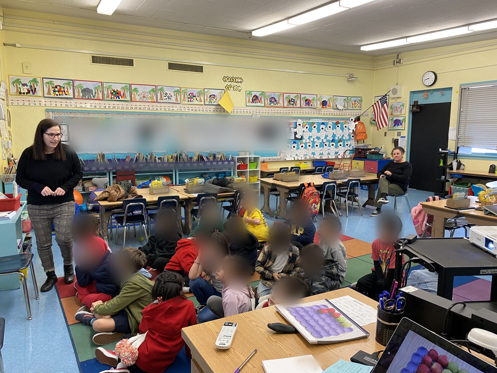 Xochitl Becerra (left) teaching her students in her Castle Heights Elementary classroom